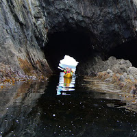 Sea Kayaking through caves on the coast