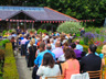 An outdoor cerimony in the walled garden