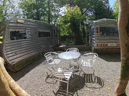 two authentic and fully fitted adjoining Roma Caravans originally built in 1988 by Baz Warters